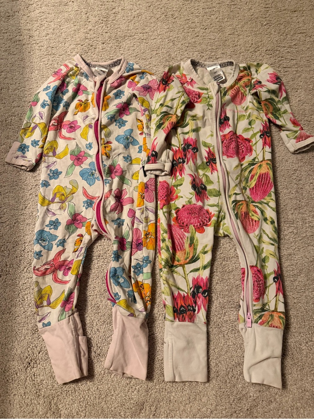 Bonds Floral Zip One-Pieces in Cream with Pink, Blue & Yellow